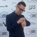 Armisen checking watch